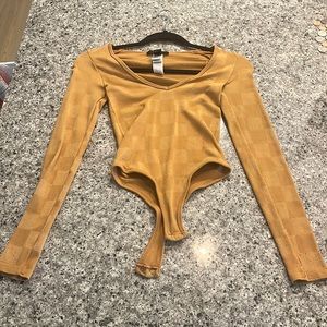 brown/tan checkered bodysuit